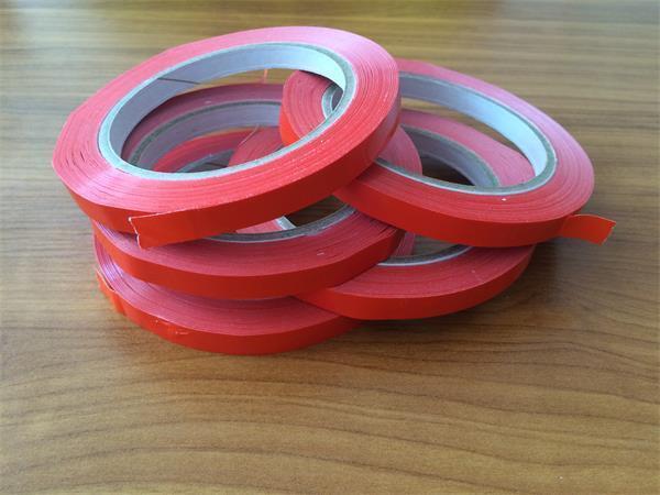 Páska na utěsnění sáčků, červená, 9 mm x 66 m, samolepicí